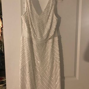 White sequin mini dress with side sheer cutouts